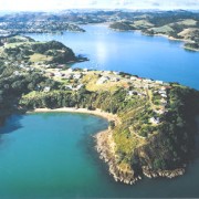 An aerial view of Takirau Bay. The venue is at the left side of the bay.